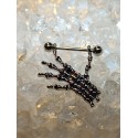 Piercing téton main de squelette